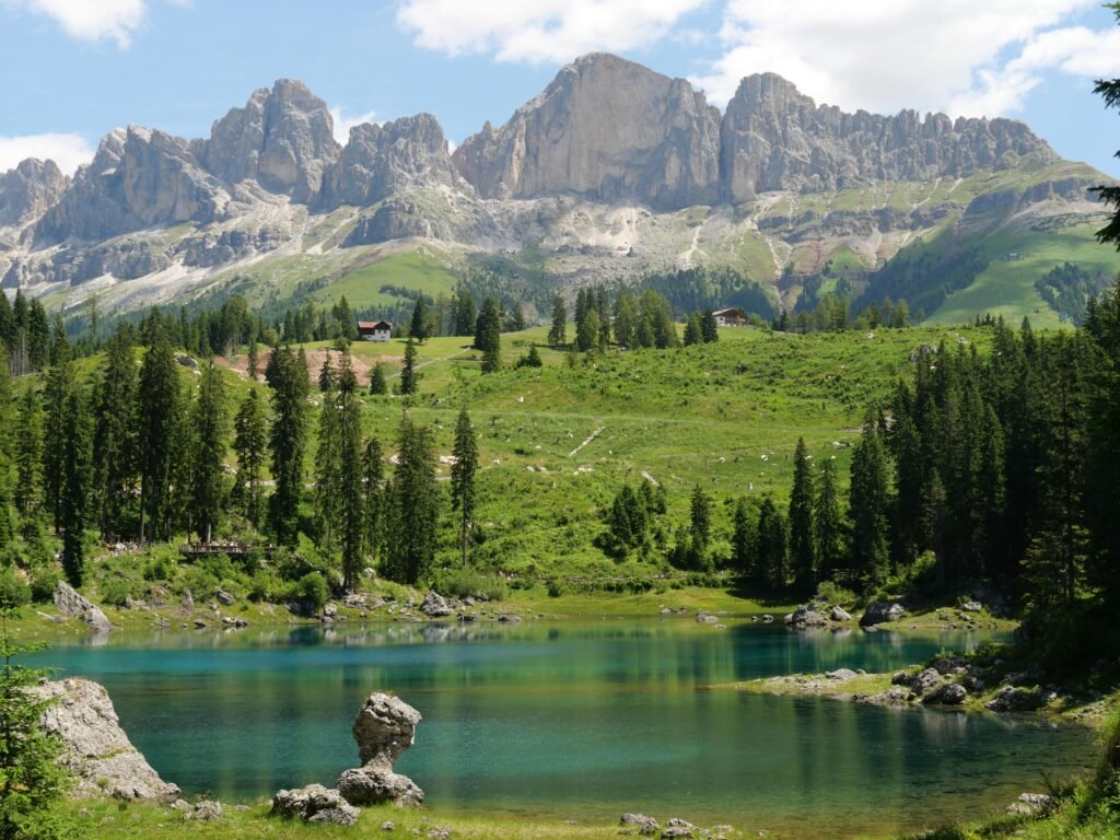 Breathtaking view of Lake Carezza with the Dolomites in the background, South Tyrol, Italy.