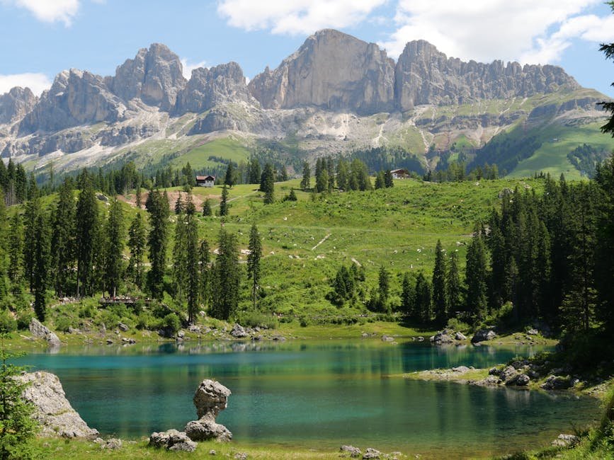 Breathtaking view of Lake Carezza with the Dolomites in the background, South Tyrol, Italy.